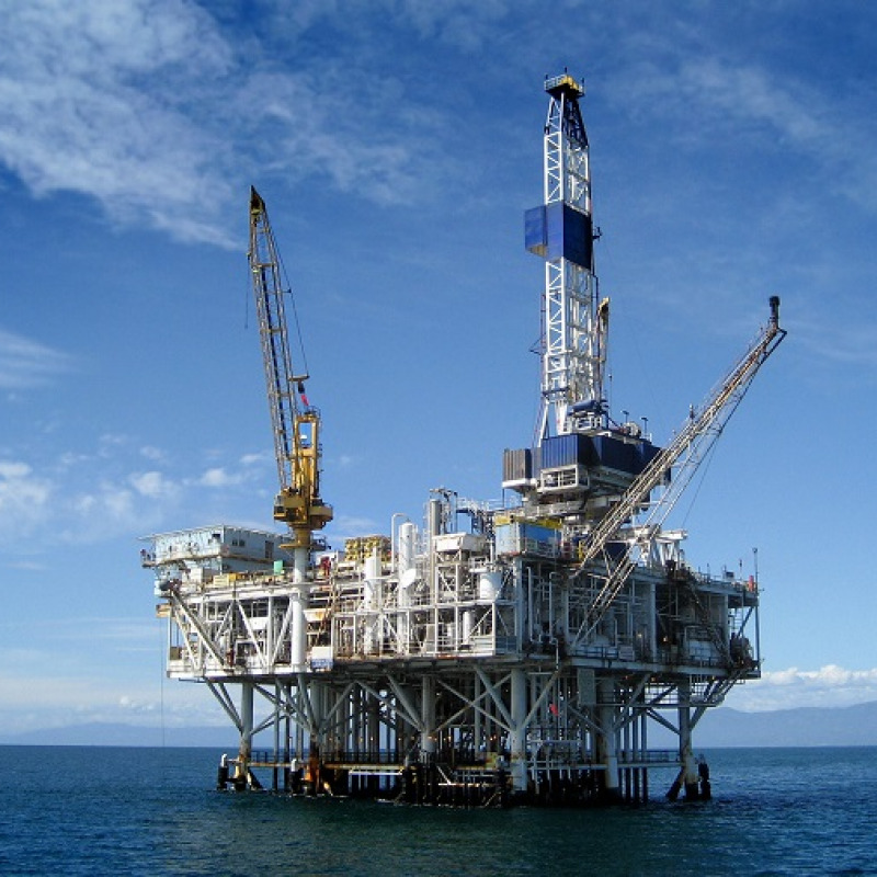 Large Pacific Ocean oil rig drilling platform off the southern coast of California.