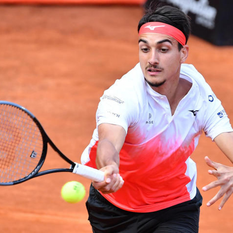 Lorenzo Sonego of Italy in action against Novak Djokovic of Serbia during their men's singles semi final match at the Italian Open tennis tournament in Rome, Italy, 15 May 2021. ANSA/ETTORE FERRARI