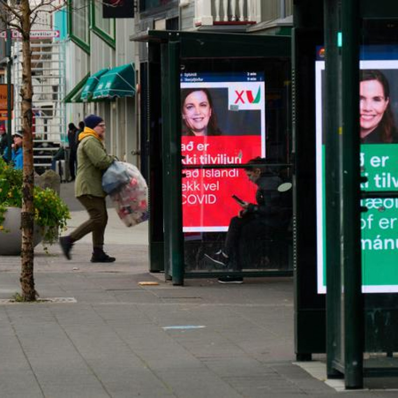 Election posters are seen at a bus station in Iceland's capital Reykjavik on September 25, 2021, during the country's parliamentary elections to elect members of the Althing. (Photo by Halldor KOLBEINS / AFP)