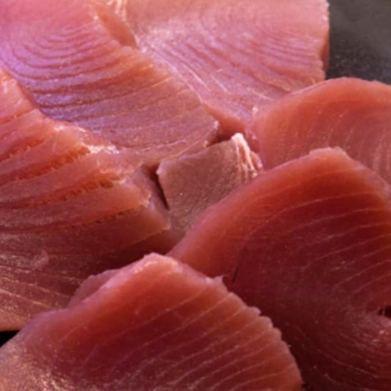 epa05698653 A wholesaler inspects fresh tuna before the first auction of the year at the Tsukiji fish market in Tokyo, Japan, 05 January 2017. A Bluefin tuna, which was caught in Oma, northern Japan, was sold for 74 million yen (631,000 US dollar), the second highest price ever, in the first auction of the new year's first auction at Tokyo's Tsukiji Market. EPA/FRANCK ROBICHON