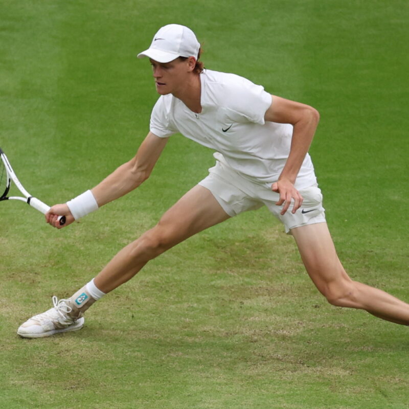 epa10746133 Jannik Sinnner of Italy in action during his Men's Singles semi-final match against Novak Djokovic of Serbia at the Wimbledon Championships, Wimbledon, Britain, 14 July 2023. EPA/ISABEL INFANTES EDITORIAL USE ONLY