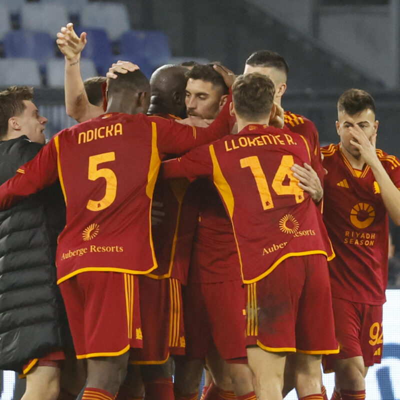 AS Roma's Lorenzo Pellegrini (C) celebrates with teammates after scoring during the Italian Serie A soccer match between AS Roma and SSC Napoli at the Olimpico stadium in Rome, Italy, 23 December 2023. ANSA/FABIO FRUSTACI