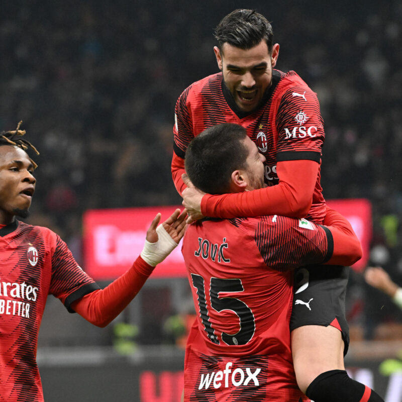 AC Milans forward Luka Jovic (below) celebrates with teammates defender Theo Hernandez and forward Samuel Chukwueze (L) after scoring during their Coppa Italia (Italy Cup) soccer match at the Giuseppe Meazza stadium in Milan, Italy, 02 January 2024. ANSA/DANIEL DAL ZENNARO