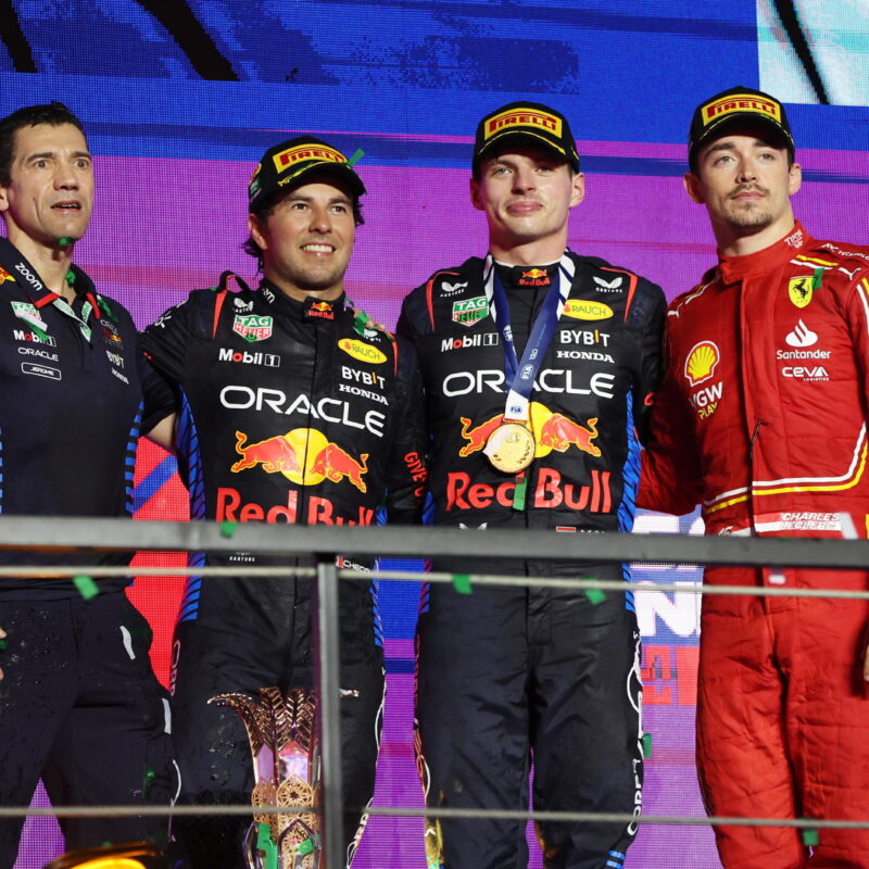 epa11209837 (2L-R) Second placed Red Bull Racing driver Sergio Perez of Mexico, winner Red Bull Racing driver Max Verstappen of Netherlands, and third placed Scuderia Ferrari driver Charles Leclerc of Monaco on the podium after the Formula 1 Saudi Arabia Grand Prix at the Jeddah Corniche Circuit in Jeddah, Saudi Arabia, 09 March 2024. EPA/ALI HAIDER