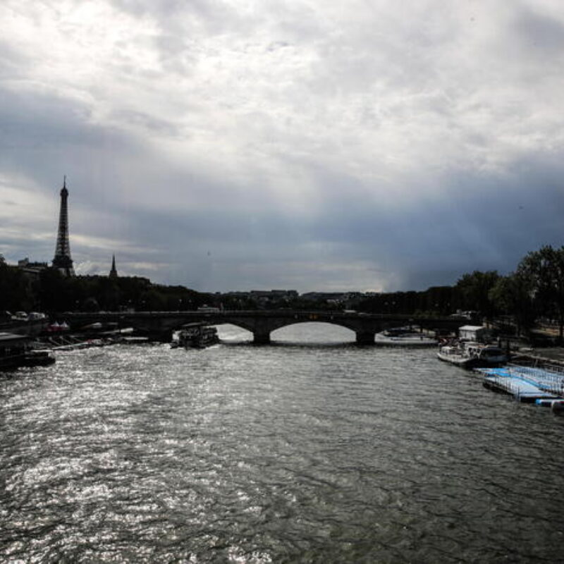 epa10784667 The Seine River as it passes through Paris, France, 04 August 2023. A training session for athletes participating in the Open Water World Cup was canceled as the water quality dropped to levels below the standards following heavy rain, the international governing body of swimming announced. EPA/TERESA SUAREZ