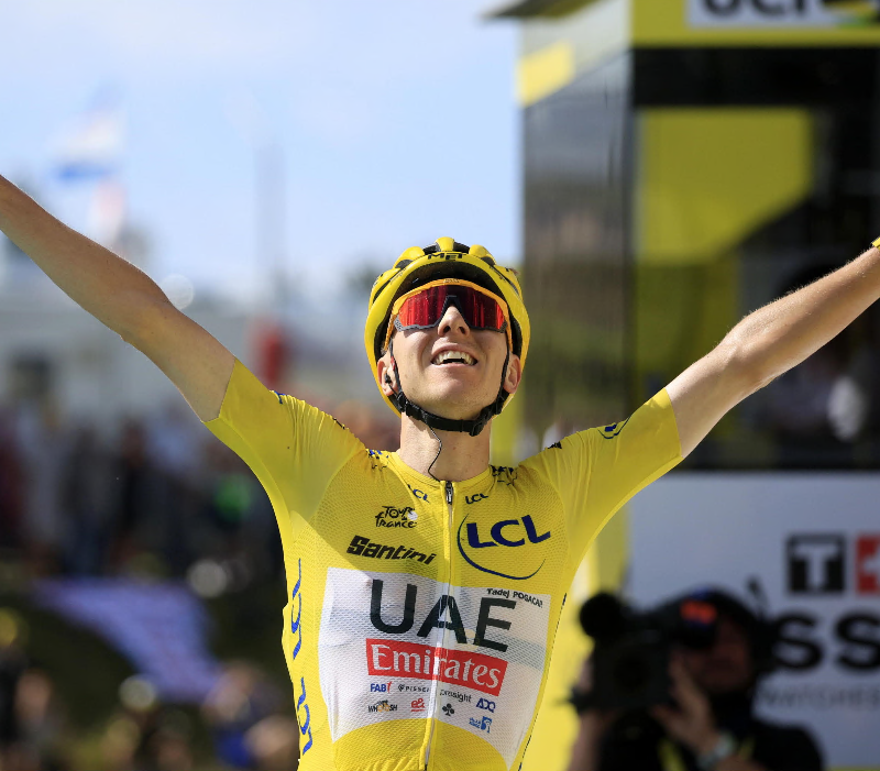 epa11477715 Yellow jersey Slovenian rider Tadej Pogacar of UAE Team Emirates celebrates as he crosses the finish line to win the 15th stage of the 2024 Tour de France cycling race over 197km from Loudenvielle to Plateau de Beille, France, 14 July 2024. EPA/GUILLAUME HORCAJUELO