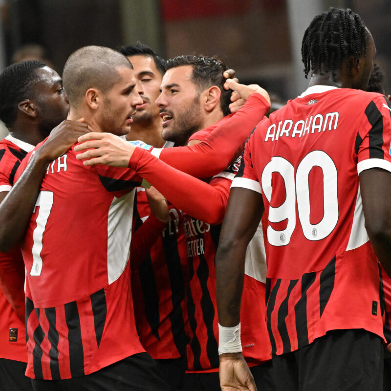 AC Milans defender Theo Hernández (C) celebrates with his teammates after scoring during the Italian Serie A soccer match between Ac Milan and Lecce at the Giuseppe Meazza stadium in Milan, Italy, 27 September 2024. ANSA/DANIEL DAL ZENNARO