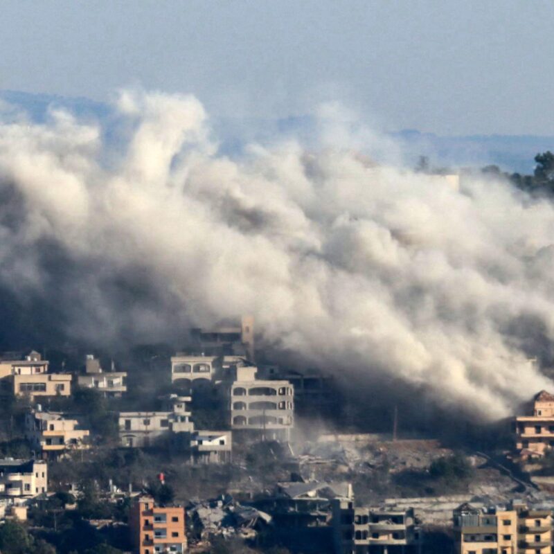 TOPSHOT - Smoke rises from the site of an Israeli airstrike that targeted the southern Lebanese border village of Khiam on October 20, 2024, amid the ongoing war between Israel and Hezbollah. Israel's Defence Minister Yoav Gallant said on Sunday that the military was stepping up its strikes targeting Hezbollah militants in southern Lebanon near the Israeli border.The Lebanese official media reported 14 Israeli strikes within minutes on Khiam. (Photo by AFP)