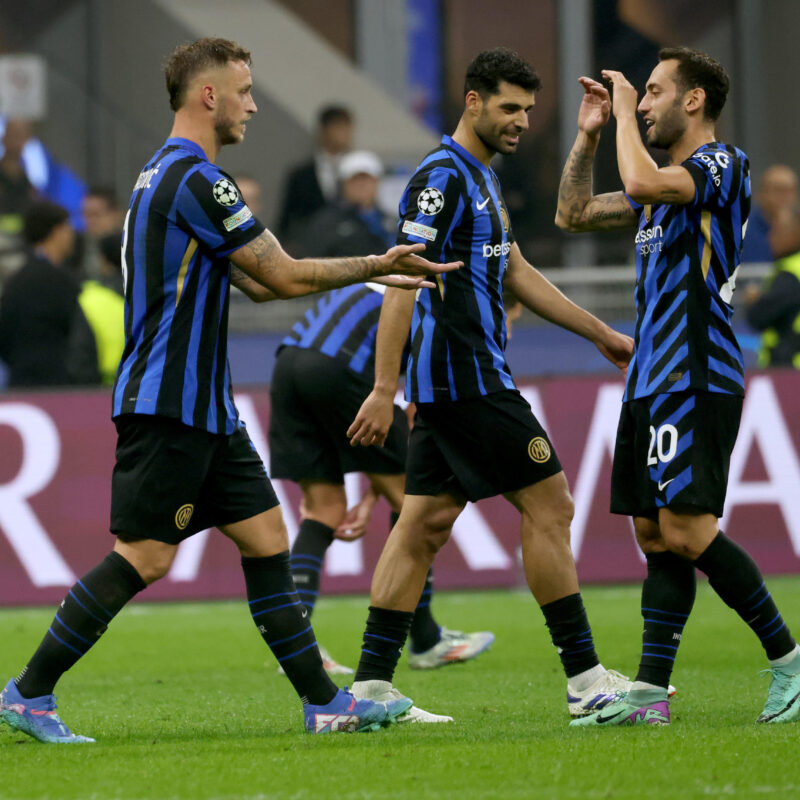 Inter Milans Marko Arnautovic (L) jubilates with his teammate Hakan Çalhano?lu after scoring goal of 2 to 0 during the UEFA Champions League soccer match between Inter and Crvena Zvezda at Giuseppe Meazza stadium in Milan, 1 October 2024.ANSA / MATTEO BAZZI