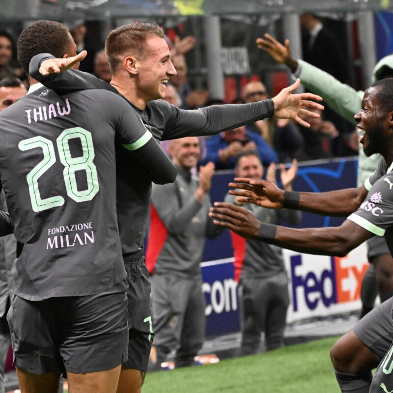 AC Milan's forward Francesco Camarda (C) celebrates after scoring during the UEFA Champions League match between AC Milan and Club Brugge KV at the Giuseppe Meazza Stadium in Milan, Italy, 22 October 2024. ANSA/DANIEL DAL ZENNARO