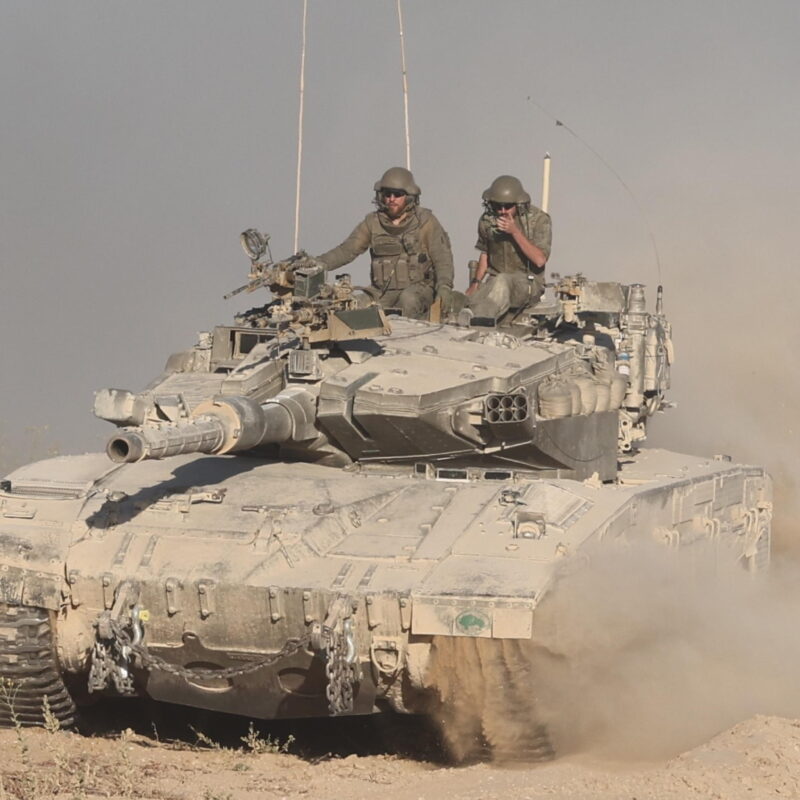 epa11672384 An Israeli tank patrols at the border gate after Jordanian aid trucks passed through the Erez crossing on the border with northern Gaza Strip, in southern Israel, 21 October 2024. According to the Israeli Army (Tsahal) and COGAT (Coordination of Government Activities in the Territories), 55 Jordanian aid trucks crossed from Israel into the northern Gaza Strip. In total 200 aid trucks entered through Erez, crossing to the northern Gaza Strip since 15 October 2024. EPA/ABIR SULTAN