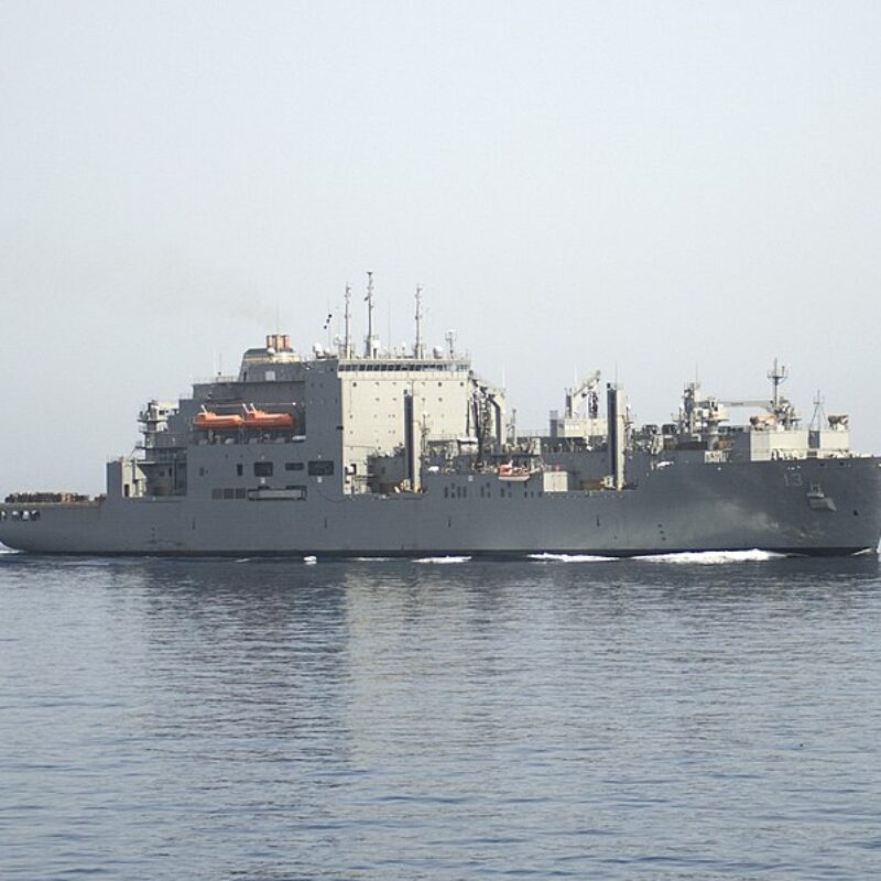 130413-N-XQ474-138.NORTH ARABIAN SEA (April 13, 2013) – The dry cargo/ammunition ship USNS Medgar Evers (T-AKE-13) conducts a vertical replenishment-at-sea with the aircraft carrier USS Dwight D. Eisenhower (CVN 69) while the guided-missile cruiser USS Hue City (CG 66) steams alongside. Dwight D. Eisenhower and Hue City are deployed to the U.S. 5th Fleet area of responsibility conducting maritime security operations, theater security cooperation efforts and support missions as part of Operation Enduring Freedom. (U.S. Navy photo by Mass Communication Specialist Seaman Andrew Schneider/Released).