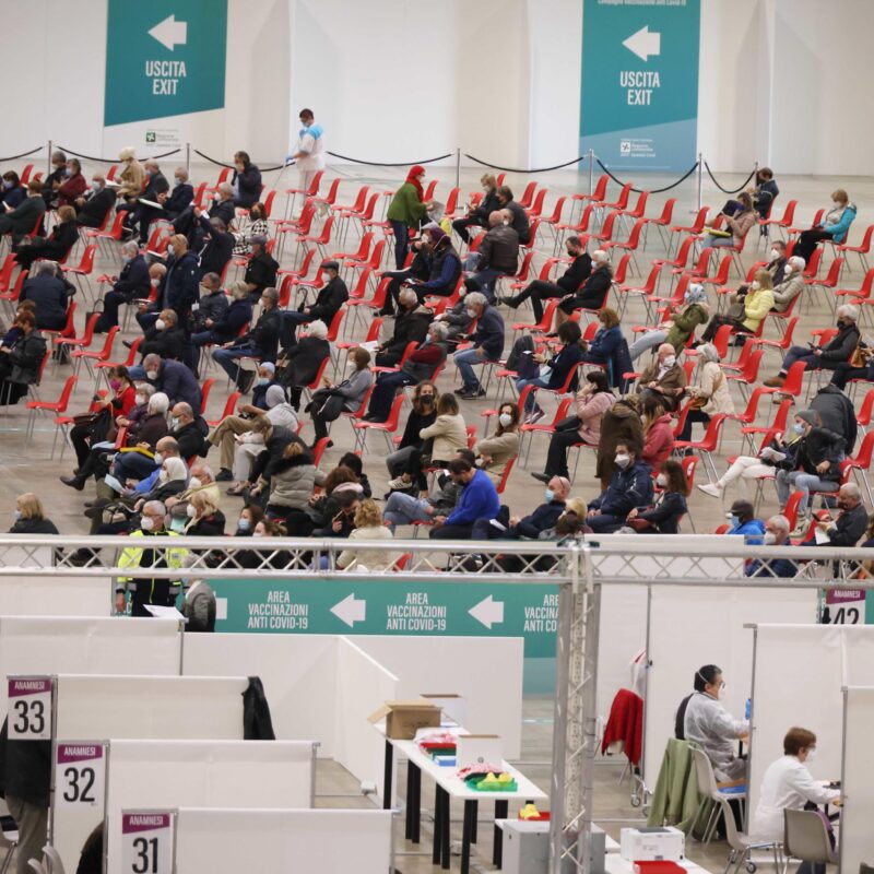 People wait to be vaccinated against Covid-19 disease at the vaccination hub set up at the Brescia Fair, in Brescia, northern Italy, 29 April 2021. ANSA/ FILIPPO VENEZIA