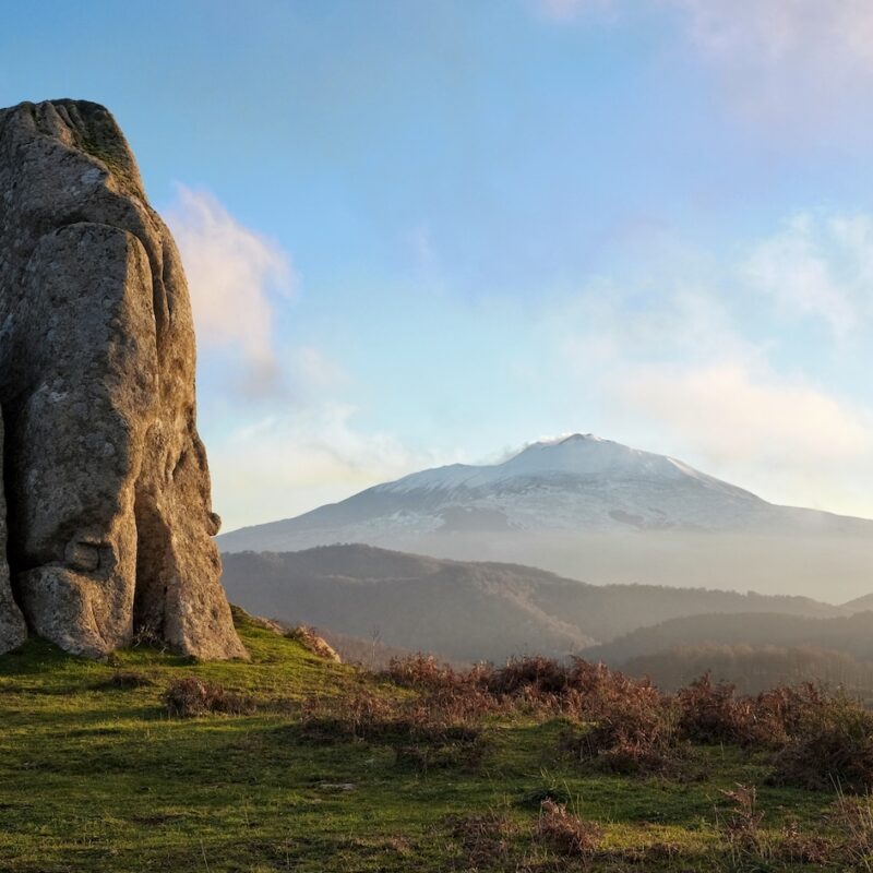 Megalith Argimusco Highland and Etna volcano Snowy, Sicily